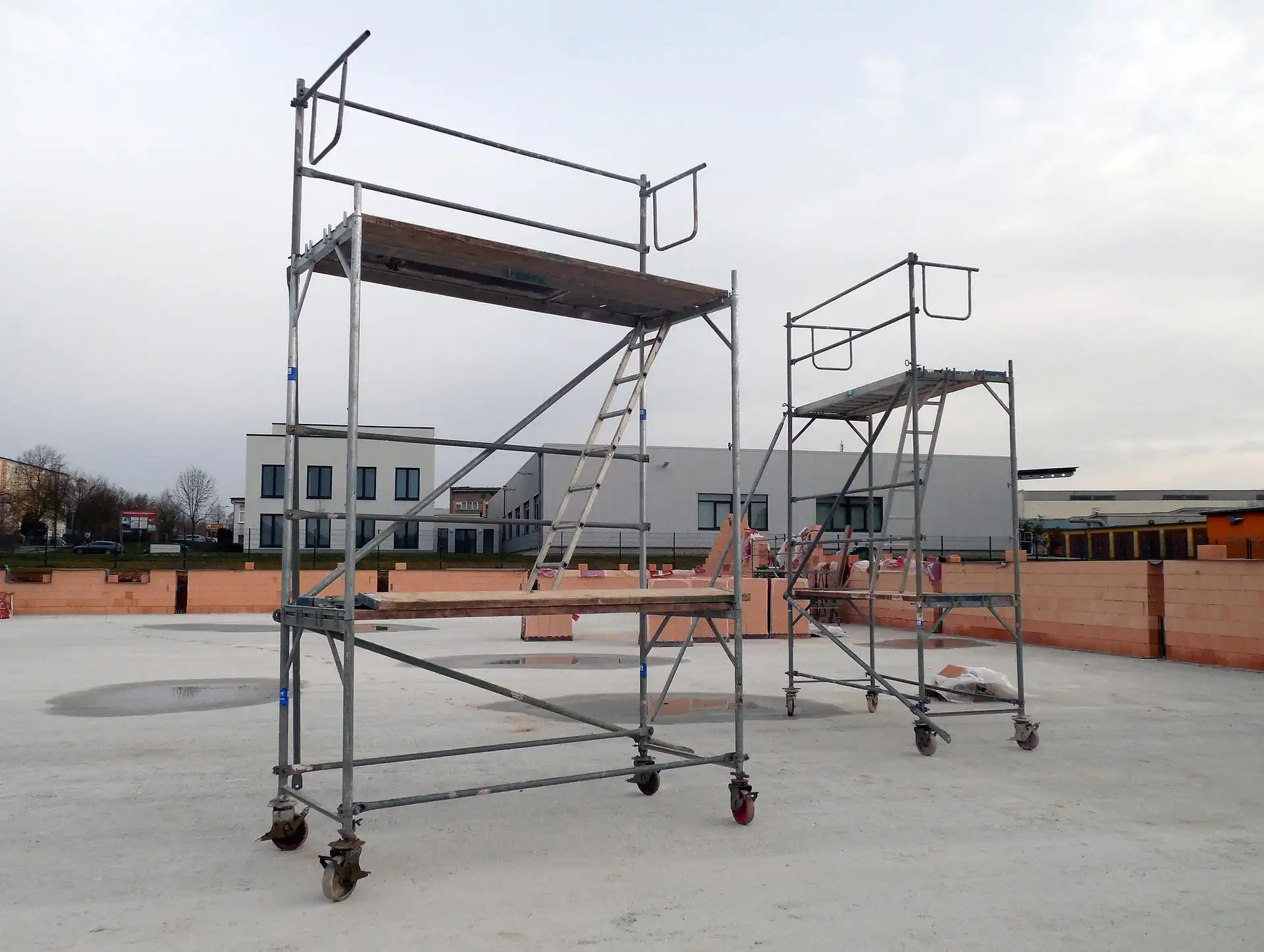East County San Diego Scaffolding mobile tower platform setup on construction slab with guardrails and ladder access